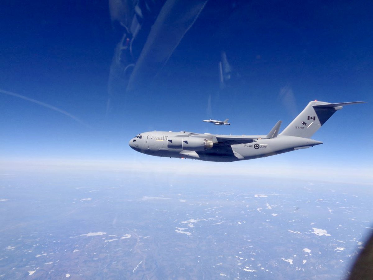 RCAF_ARC's tweet photo. In a simple but meaningful gesture, CF-18 pilots welcomed home their six fallen colleagues Wednesday by escorting their aircraft as it crossed into Canadian airspace.

#RCAF #CAF #Respect #OurForces https://t.co/Llw3Rkbl97