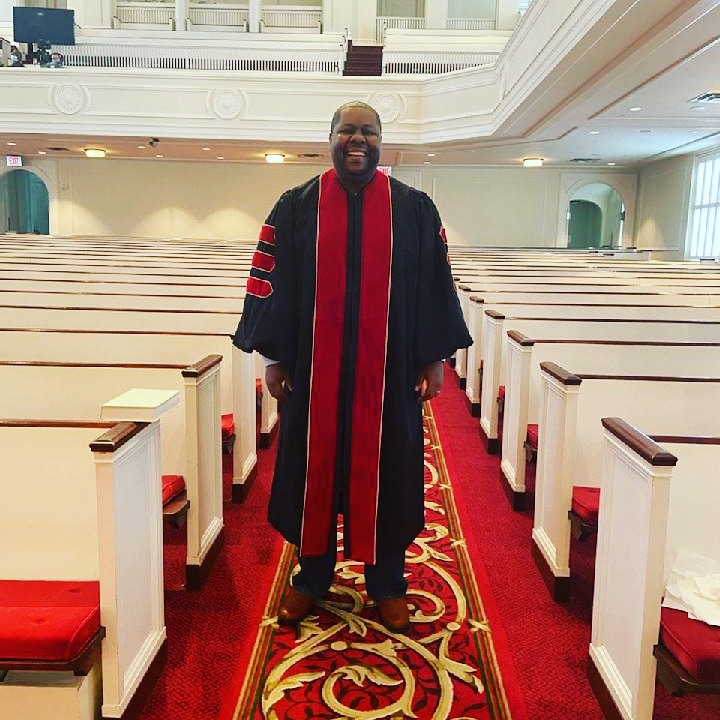 JWScott4444's tweet photo. I went to the church to record a service, and Second Ponce surprised me with a beautiful robe to celebrate my graduation which is tomorrow! I am usually a hard person to surprise but they caught me slipping lol. Thank you Second Ponce I love you all and appreciate this! https://t.co/hmA6my3MbX