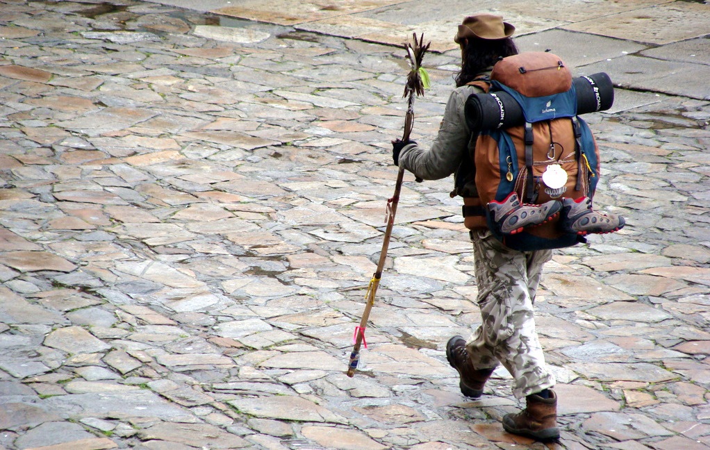 #Sibilaf
Response to the charade:
Was the Pilgrim alone or accompanied?
Was it someone who put someone's socks on or was the pilgrim a lonely traveler?
What number did the pilgrim wear?