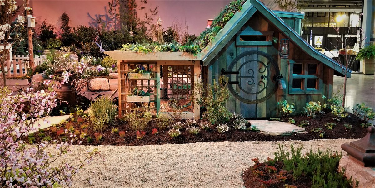 A #chickencoop covered and surrounded by #plants and #flowers! Talk about the ideal #outdoorliving environment.. #PlantsHeal #TerraVitaDesigns #LiveWellLiveInspired