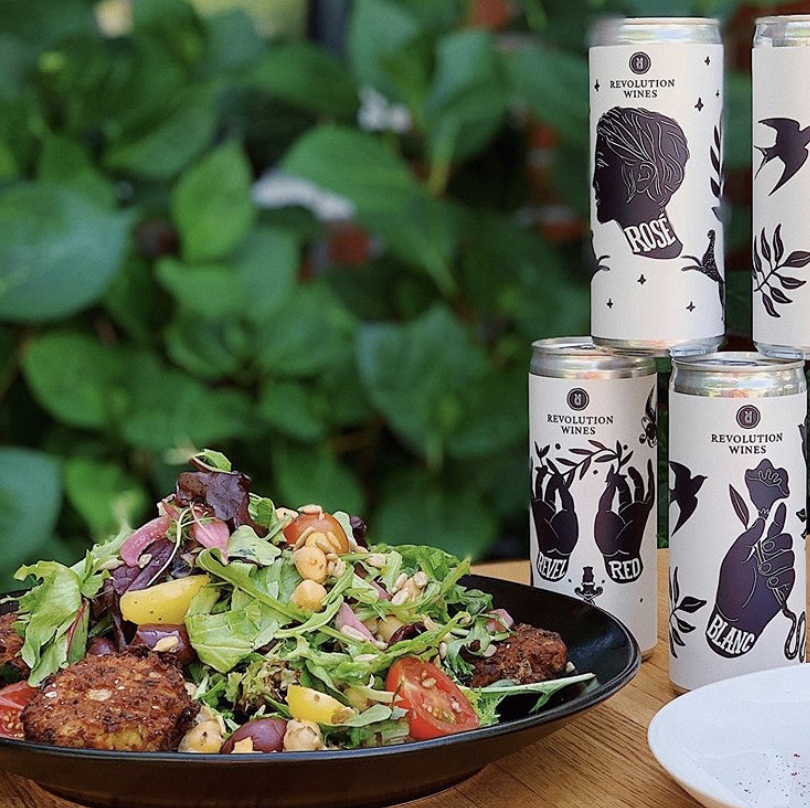 Revolution Wines 2020 CANNED WINES are now available, 4-packs of each or a mixed 6-pack. Goes nicely with their Mediterranean salad and perfect for Mother’s Day at the river, park, or yard.
Revolution Winery &amp; Kitchen
2831 S St / 916-444-7711