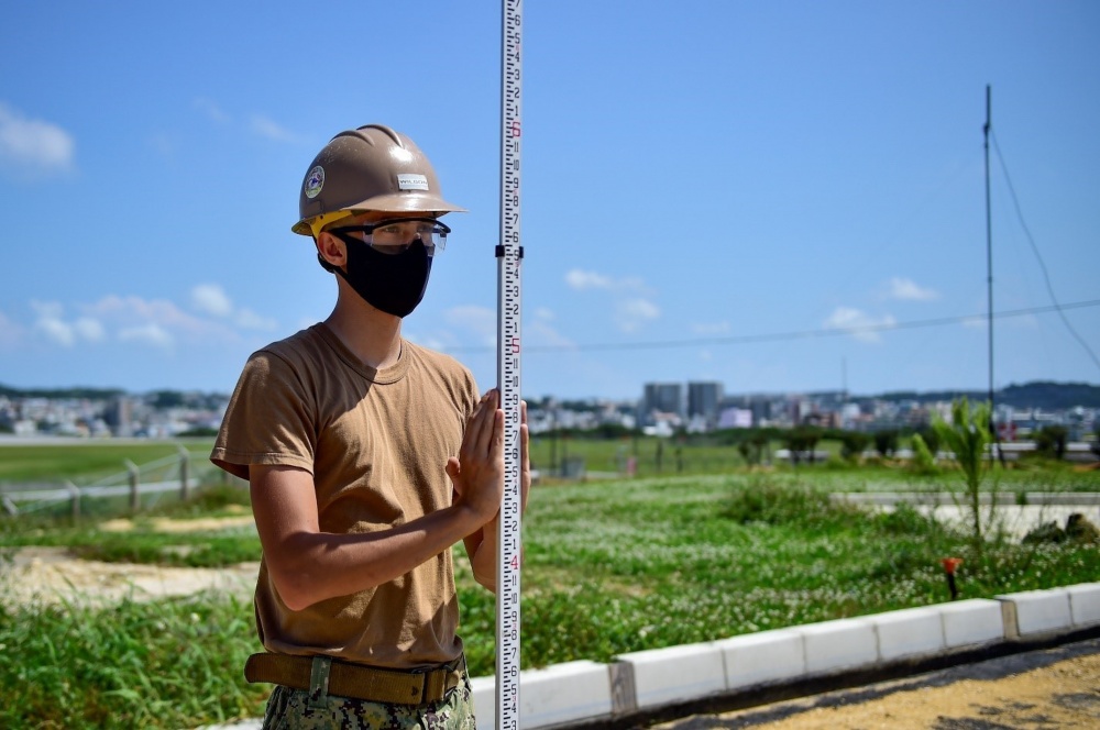 USPACOM's tweet photo. Seabees with Naval Mobile Construction Battalion 5 #NMCB5, are constructing support facilities for Marine Air Control Squadron 4’s #MACS4 Ground/Air Task-Oriented Radar System on Okinawa. #ForgedByTheSea #FreeandOpenIndoPacific. https://t.co/eCnXkEQTjP