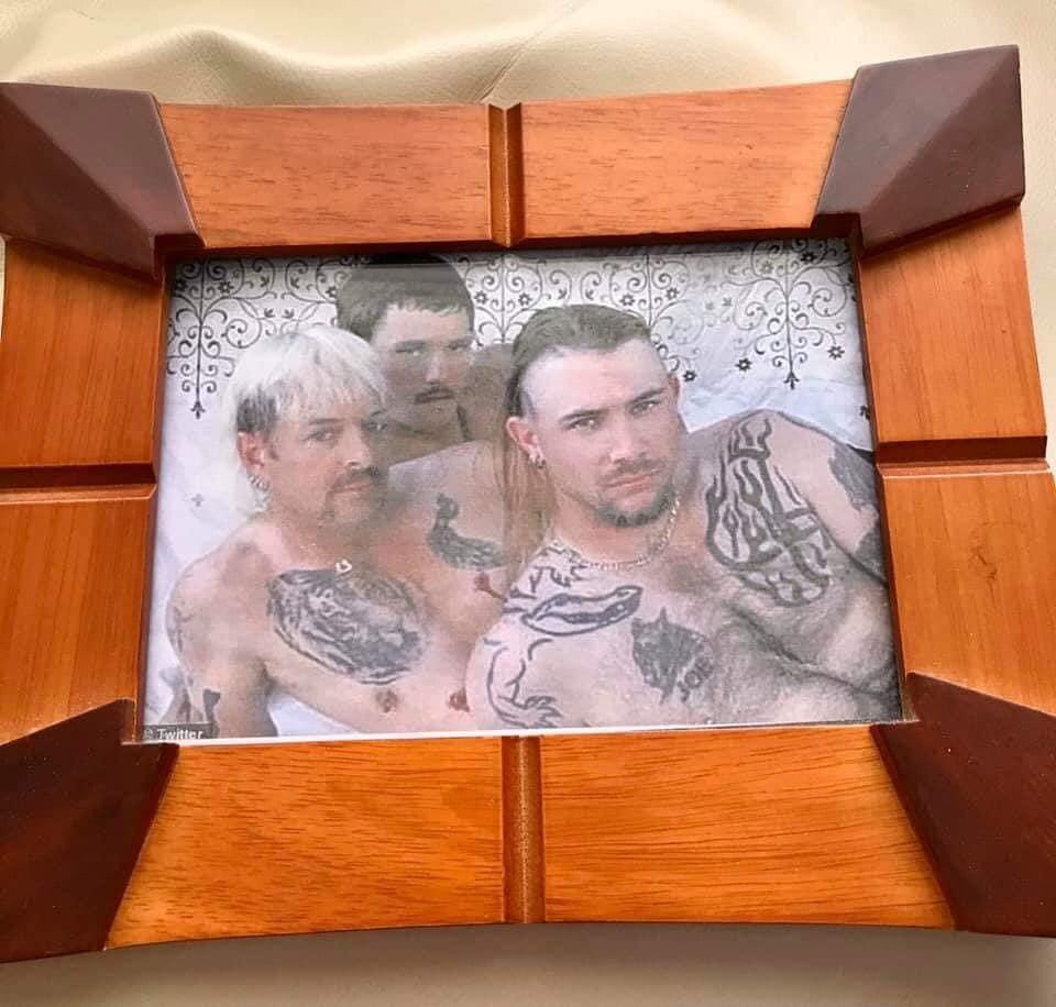 WindlePoons76's tweet photo. I’ve been secretly replacing family photos at my parent’s house for the past nine days. Now the whole shelf is done. No one has noticed yet. https://t.co/8JDiGRGBG6