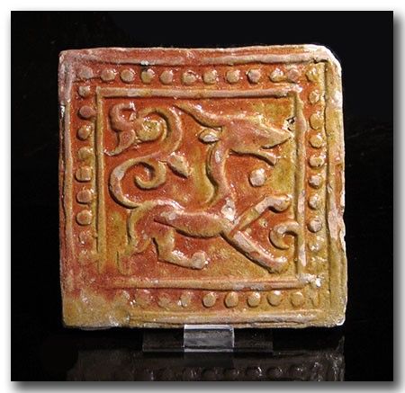 Ghaznavid amber-glazed pottery tile.