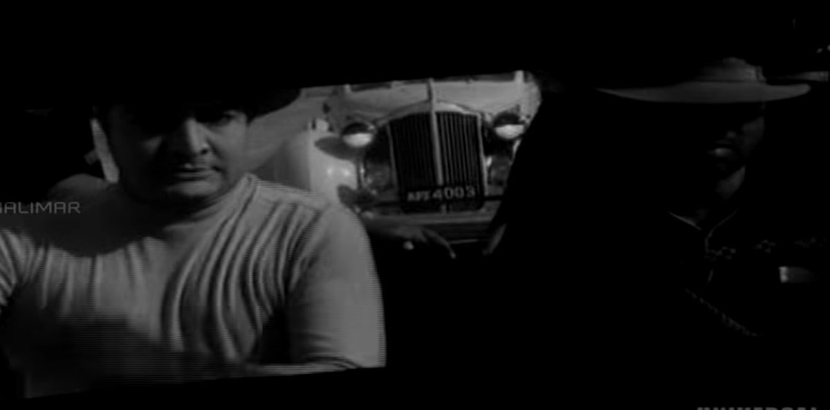 NTR driving what appears to be a 1939 Packard 12 (at least the Art Deco dashboard and steering seem to suggest so) in a moive circa 1970 He seems to have a car phone installed - an unheard of phenomenon in India, leave alone in movies.