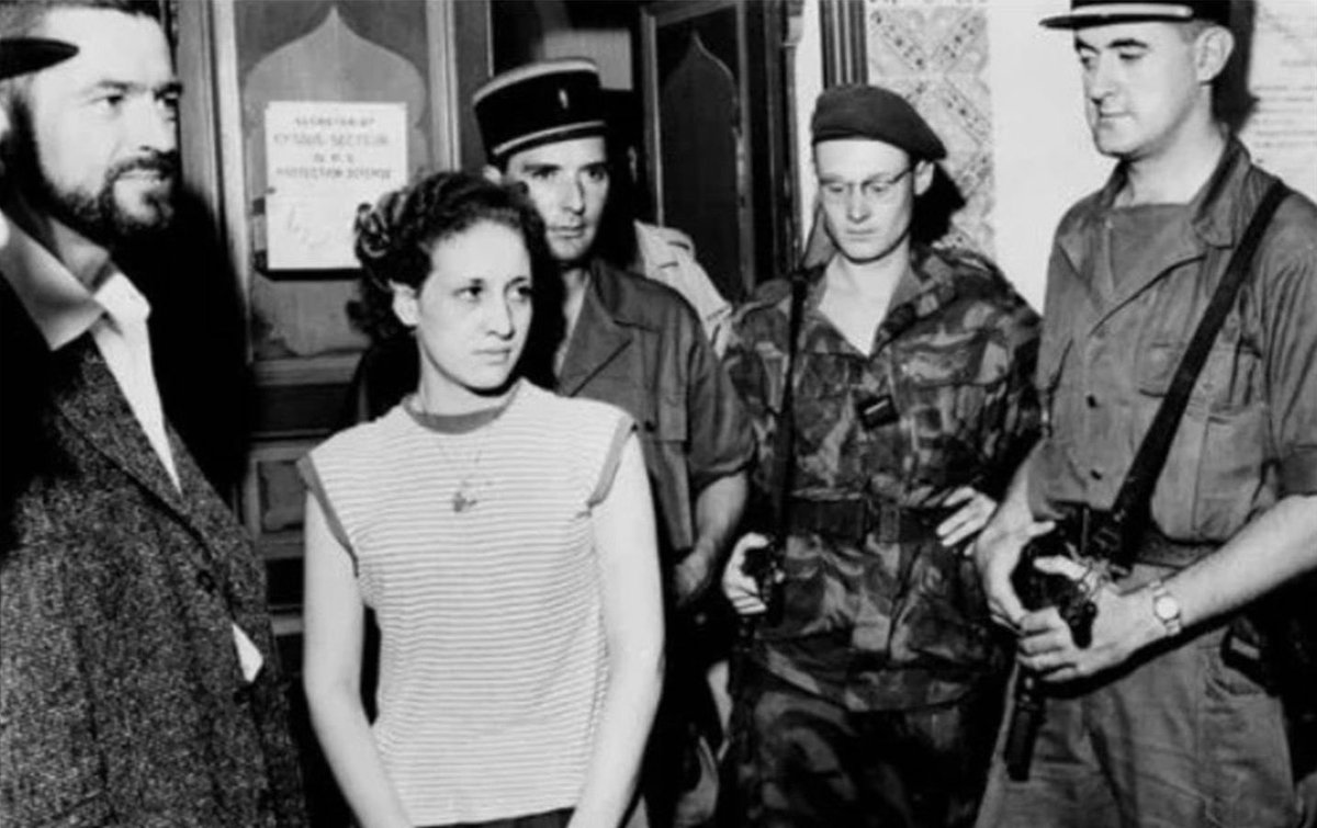 Zohra Drif, an FLN fighter during the Algerian War of Independence, seen here under arrest in October 1957.   #resist  #NoPasarán  #ALutaContinua  #Algeria  #France