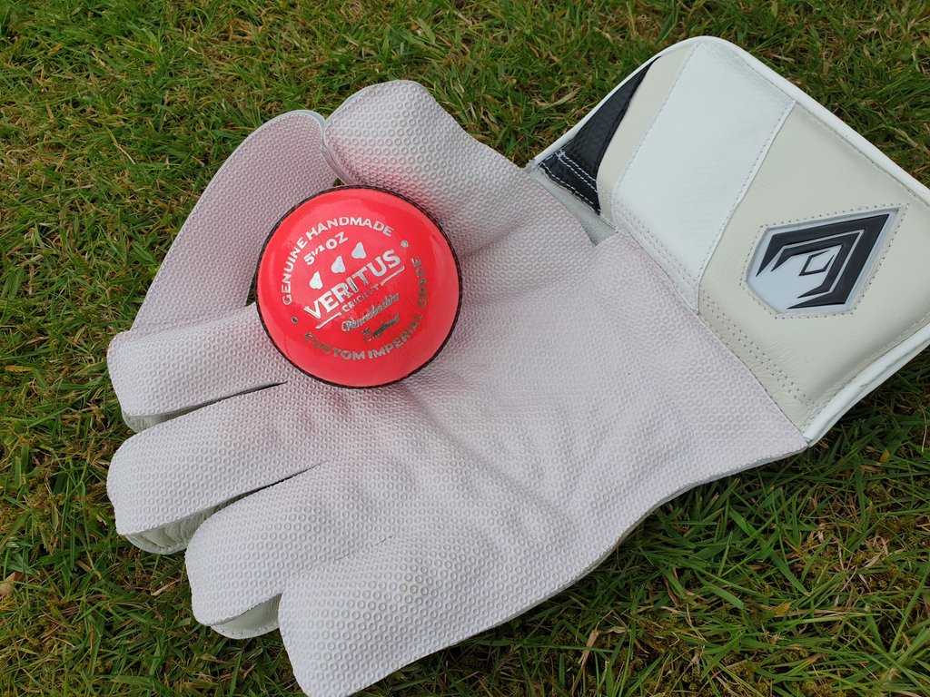 SportsVeritus's tweet photo. Wicketkeeping gloves with our pink 45 over handmade cricket ball #pinkballs #wkgloves #wicketkeeping #veritus https://t.co/6rn8fjDRtu