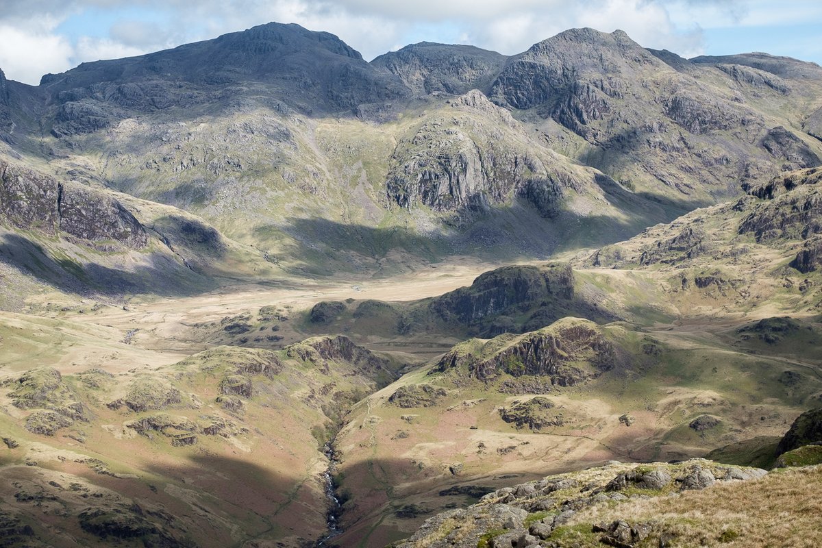 If you can sneak past the sheep (and it isn't raining), do have a walk up to Border End for a cracking view of the Scafell range