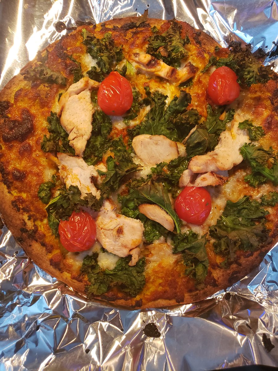 Trish_T's tweet photo. #BeforeAndAfter Simple #SpinachWrap #pizza Oven on broil for 7-10mins for crunchy edges! #TomatoPesto #Italianblend shredded cheese #kale #tomato The #chicken was dry though. 😑 #QuarentineLife #Foodie https://t.co/FjKDge7zEG