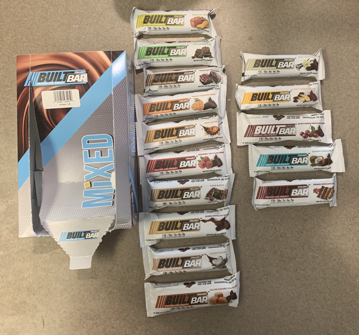 DHarrison82's tweet photo. Just got my second box of @bar_built! The left hand row is my rankings, best at the top, from the flavors I’ve tried thus far. The right are the flavors I’ve yet to try. All are good, and all of these come in the mixed box! Use promo code: ‘LockedOn’ to get $10 off your 1st box! https://t.co/sTogz6bfgW