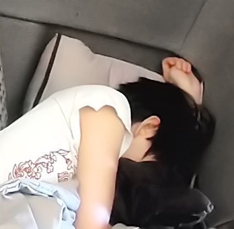 He clenches his fists when he's sleeping