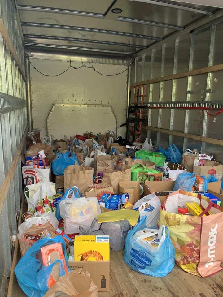 baughaw's tweet photo. So proud of my Mia and the third graders from Trinity East for their efforts to help the community!  They held a neighborhood food drive this morning to support the Greater Washington County Food Bank. Filled an entire box truck! @east_trinity @TRINITY_MLUCAS @HillersPride1 https://t.co/h0QSP6E1Z8