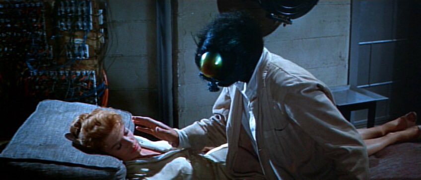 THE FLY 1958 is a CinemaScope nightmare, an Atomic Age sci-fi/horror wrapped in a murder mystery that influenced several genres for decades. If the ‘86 version is a parable for disease, this adaptation of Langelaan’s story is an analogy for disfigurement and mental illness.