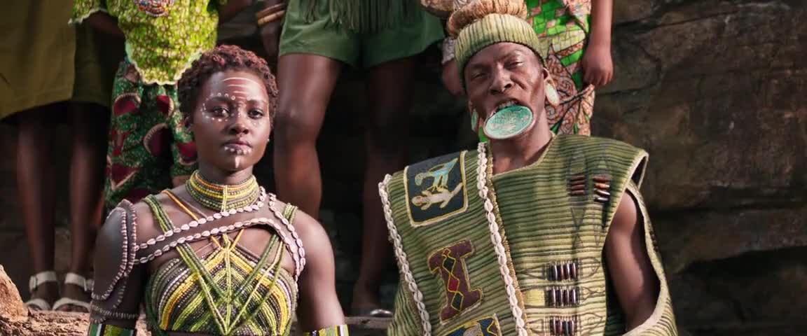 6. A Wakandan elder in the throne room wears a lip plate which draws inspiration from the Mursi culture in Ethiopia - also seen among Chai and Tirma. Seen as a source of pride and also identity. Typically worn by women, but worn by a man in the film.Film  Original 