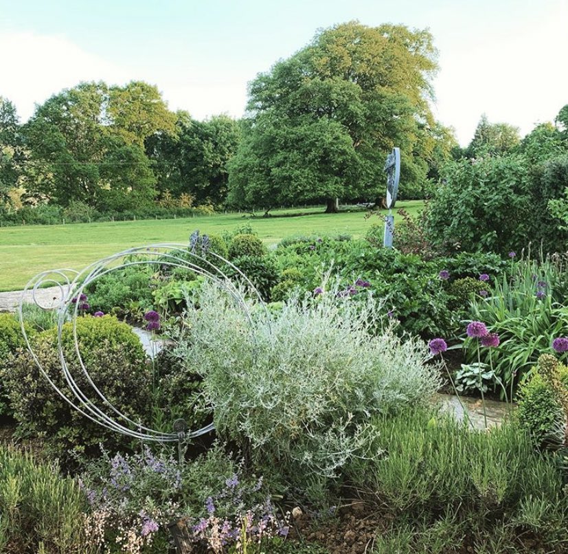 ruperttill121's tweet photo. Allium mania! Enjoying my garden on National Garden Day .All of these plants were planted here after spending the week at RHS Chelsea on my stand. Normally I am about to start build up @The_RHS #gardenday #nationalgardeningday #garden #gardenart #sculpturegarden #rhs #rhschelsea https://t.co/M6dFNUYeTK