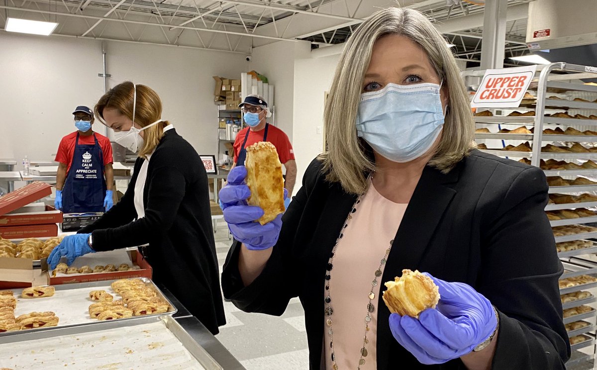 trainorTO's tweet photo. NDP Leader Andrea Horwath joins the volunteer teams at Kitchen24 to help with the #FeedToronto Initiative. Meals are packed to go all over GTA. #CBC https://t.co/lOxTJDbd9Z
