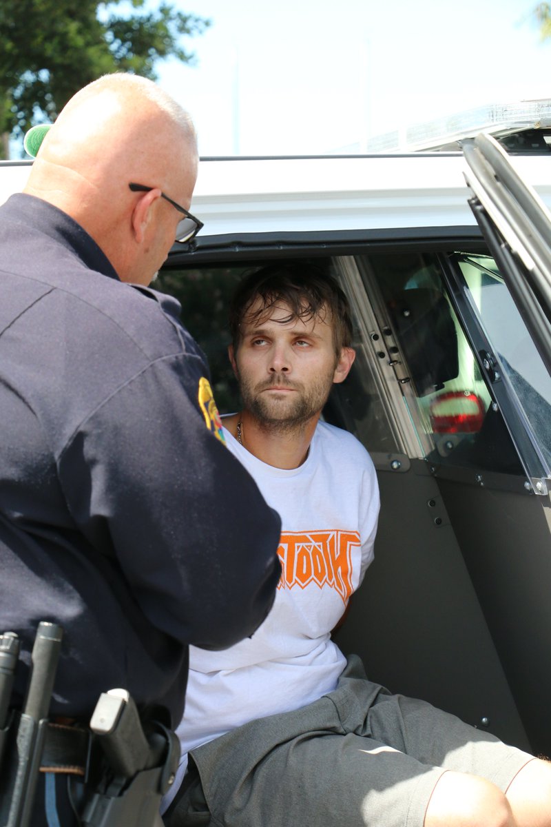 myclearwaterPD's tweet photo. Tarpon Springs driver faces multiple charges after driving on pedestrian pathway along Memorial Causeway, narrowly missing multiple bicyclists and pedestrians. Officers were able to take him into custody after he bolted from his car near the marina. https://t.co/yuQTa1exDV