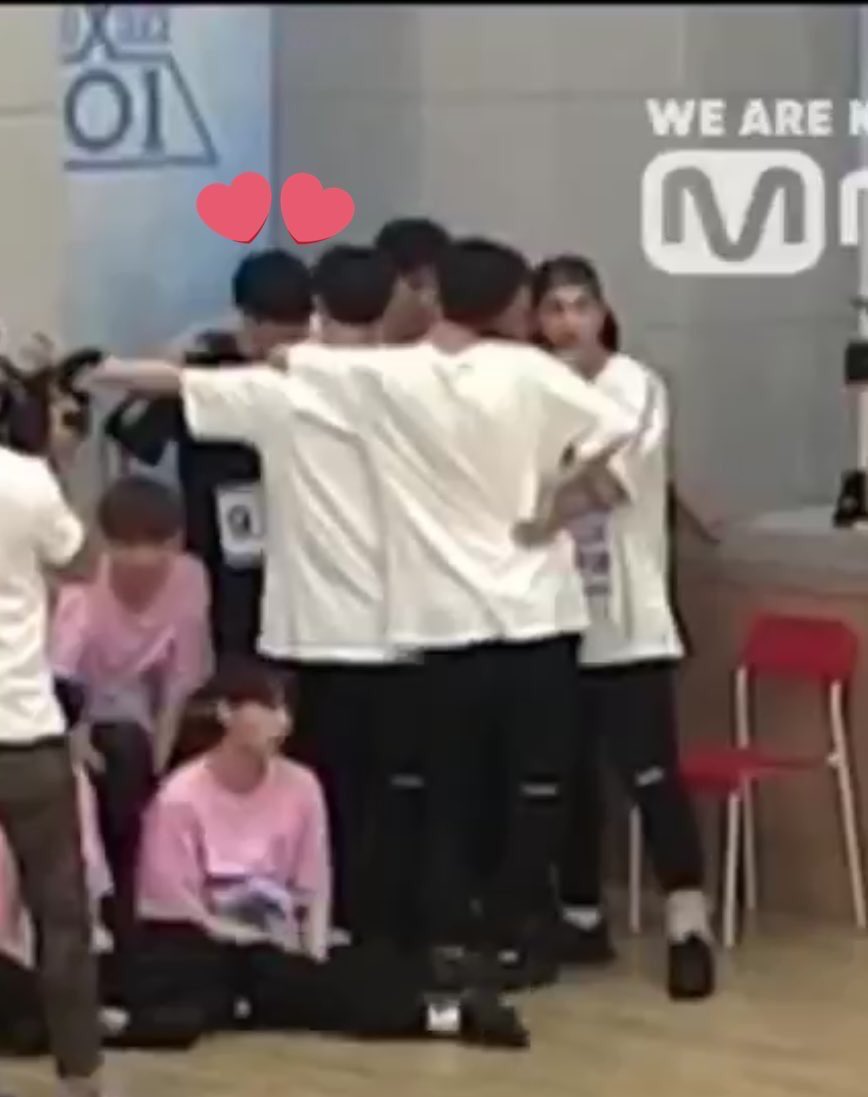 snoopywooshin's tweet photo. it’s sad that mnet never released this clip of move team comforting seungwoo and u got it team because of that harsh comment a trainer gave :( https://t.co/YZOj7WgDIu