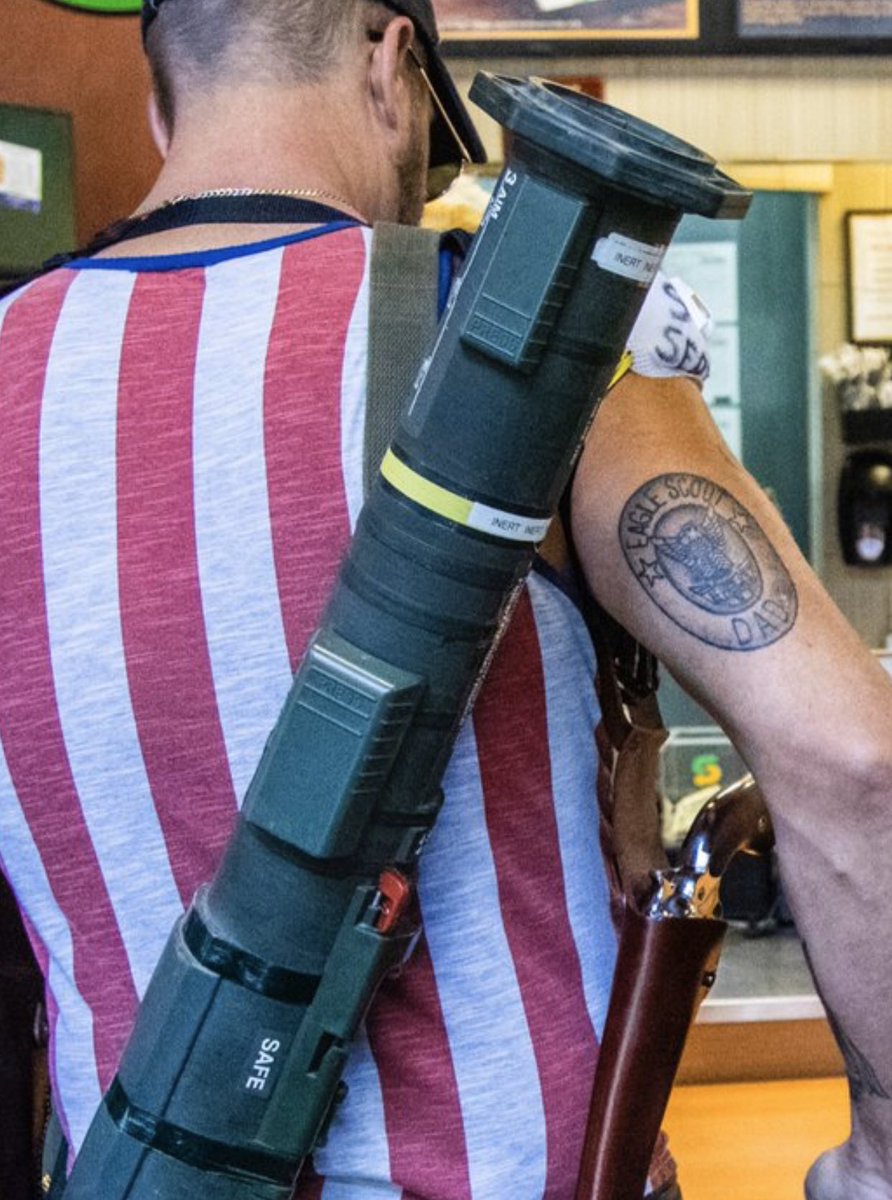 In case you were wondering, this is tough guy cosplay in the most ~literal~ sense of the word. He’s carrying a big prop weapon around because he’s an idiot poser trying to look intimidating to the guy who has to make his sandwich, I guess.