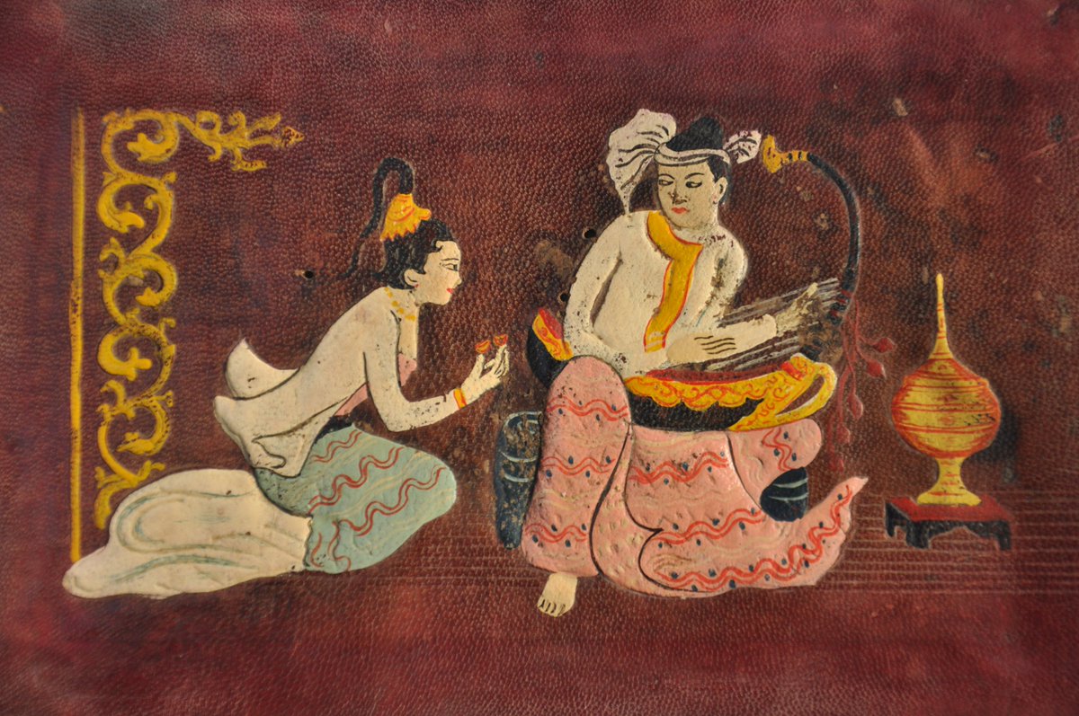 With traditional Burmese-style hand-painted figures: a dancing girl with cymbals accompanied by smaller figures playing goblet drums called ozi on the front, and on the back, a colourful rendition of musicians playing smaller finger-cymbals and a saung, the Burmese harp