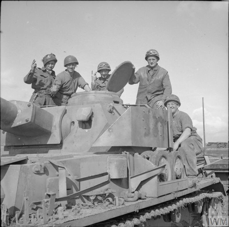 In IWM B6350 we get to see the stars of 27th Armd’s workshops who have recovered this Pz, we can also see an old turret number has been blanked out...