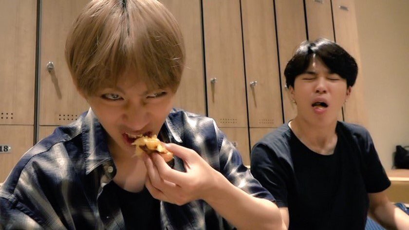 Jimin choking on his food while Taehyung is just-