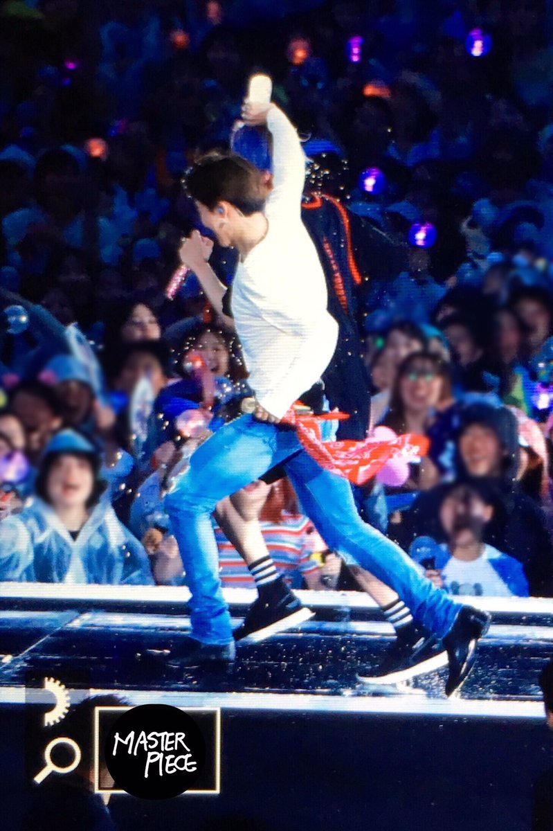 Jimin chasing Seokjin with a water bottle