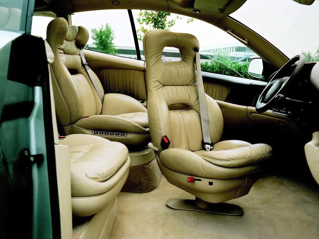 DarraghMcKenna's tweet photo. I don’t think we appreciate how batshit 90s car design was. https://t.co/vIhWx1Epat