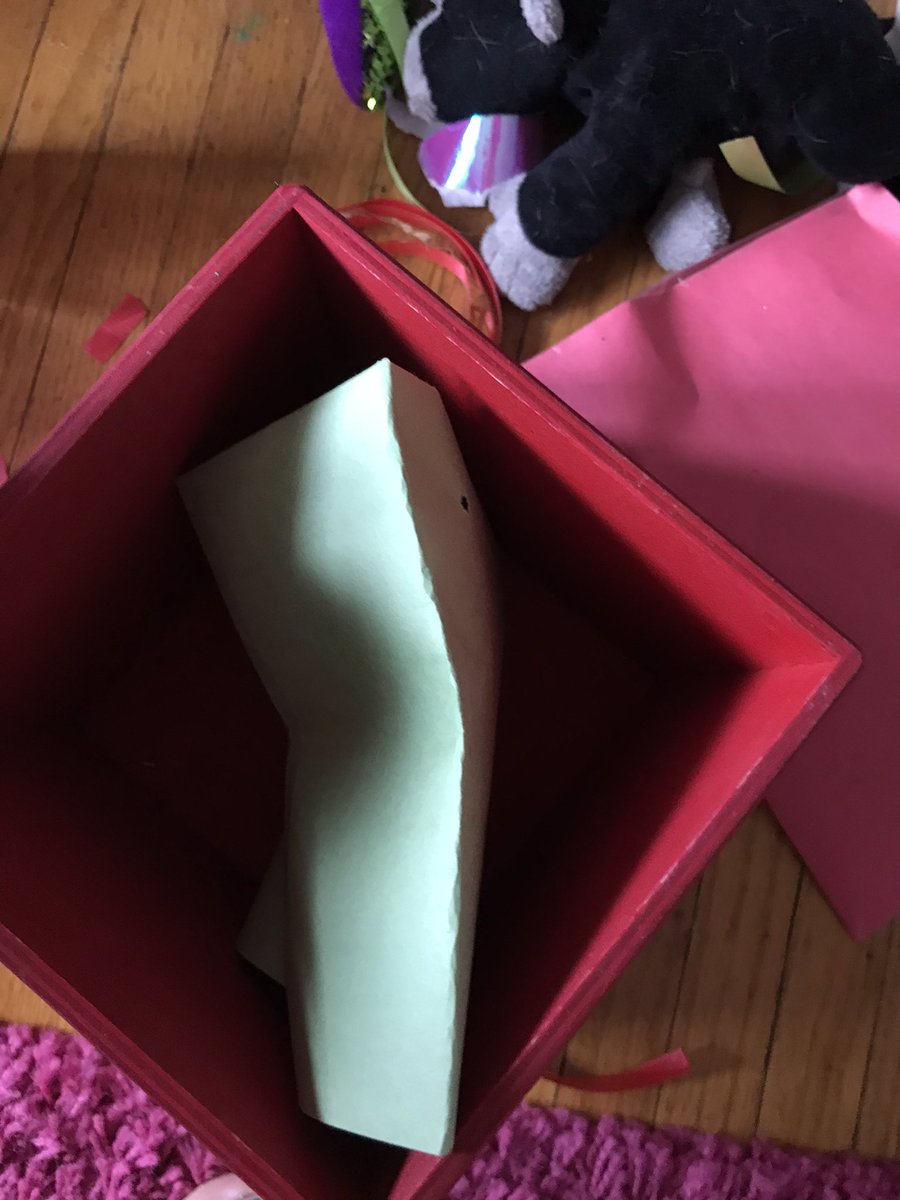 The fifth and final layer was a loot bag!! Including “several types of currency” and a unicorn eraser in my favorite colors