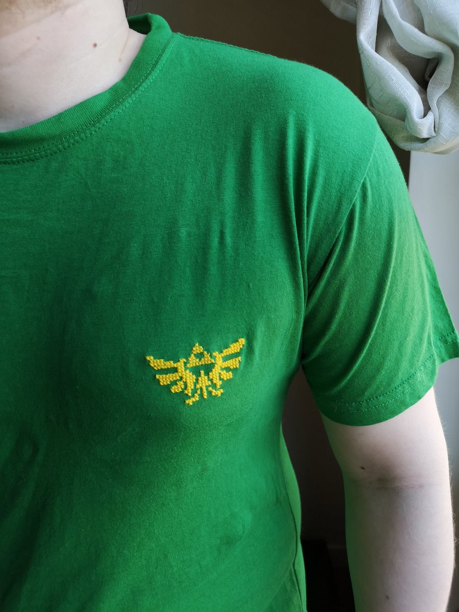 Hylian Crest on a green t-shirt!