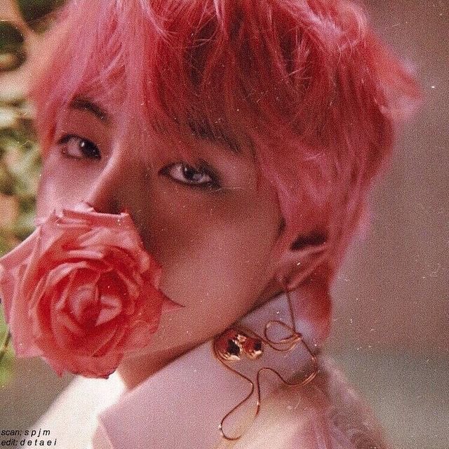 in his pink hair