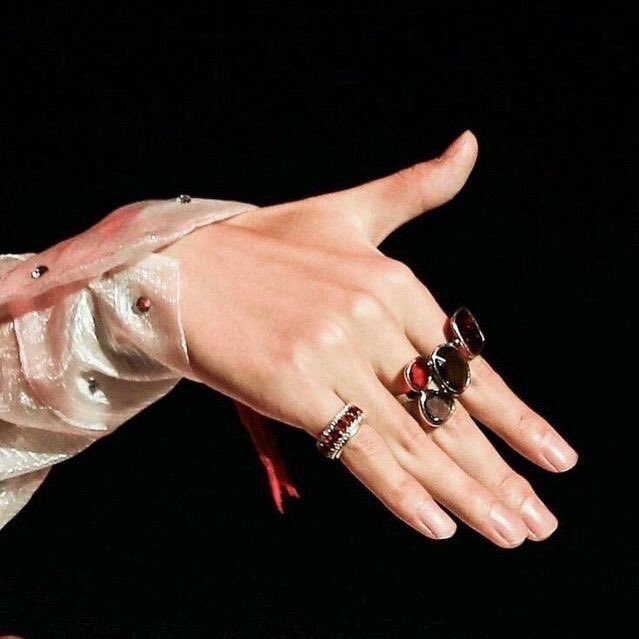 his hands in those jewelries