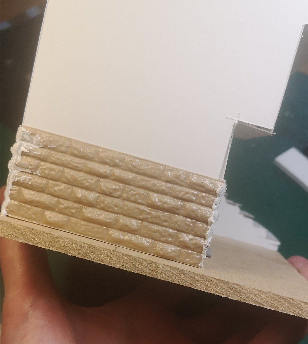 I wanted the lower part of the walls of the ground floor to be stonework, so I've used some  @greenstuffworld textured plasticard and filled the gaps at the corners with plastic putty #miniaturepainting  #ttrpg