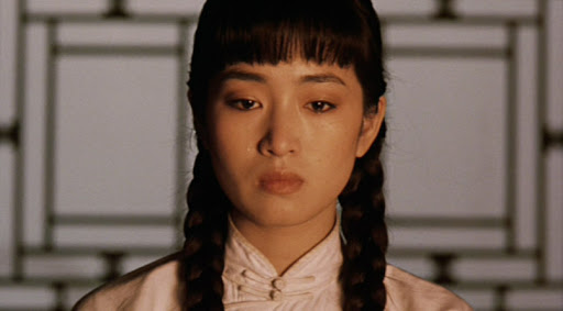Gong Li, Raise the Red LanternLi is so believably embittered, so matter-of-fact about her fate as a stranger's plaything that she makes the vast compound where the film takes place feel like a tomb built solely for her occupation, immovable, severe, and final.