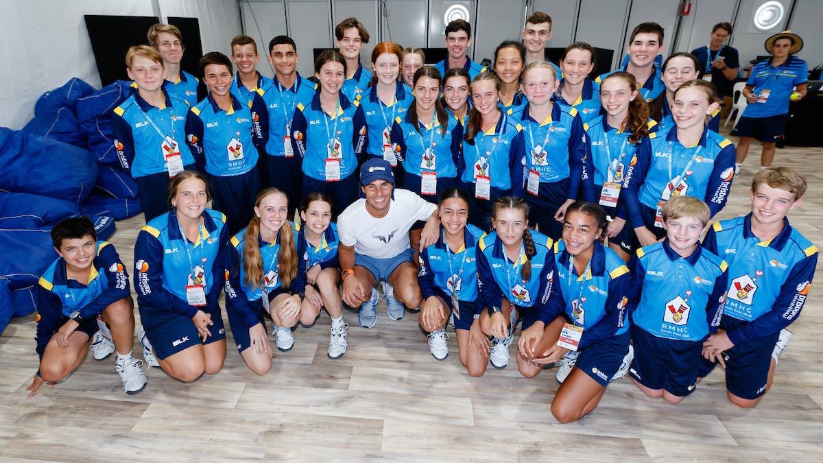 Rafa also finds time to meet ball kids and volunteers of Brisbane tournament.