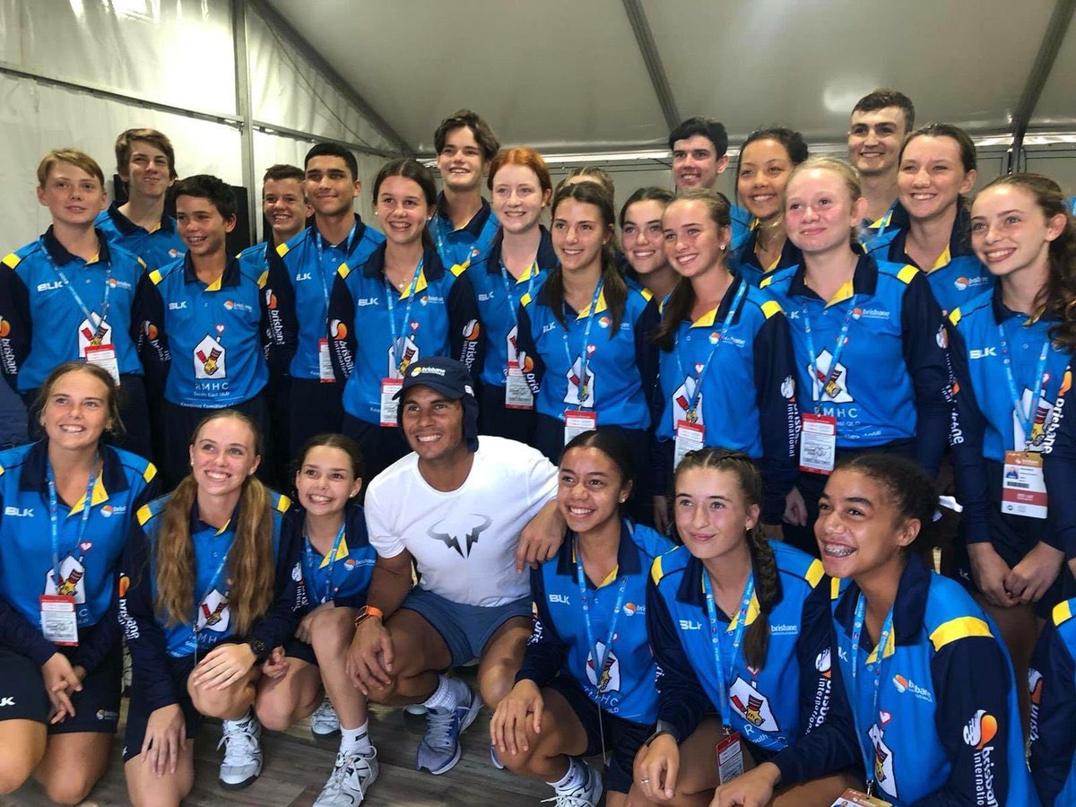 Rafa also finds time to meet ball kids and volunteers of Brisbane tournament.