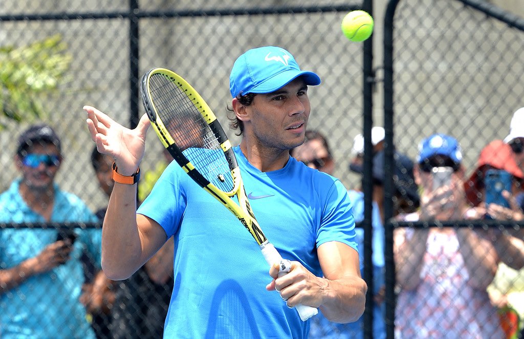 Before flying to Melbourne he holds a Tennis Clinic for kids.