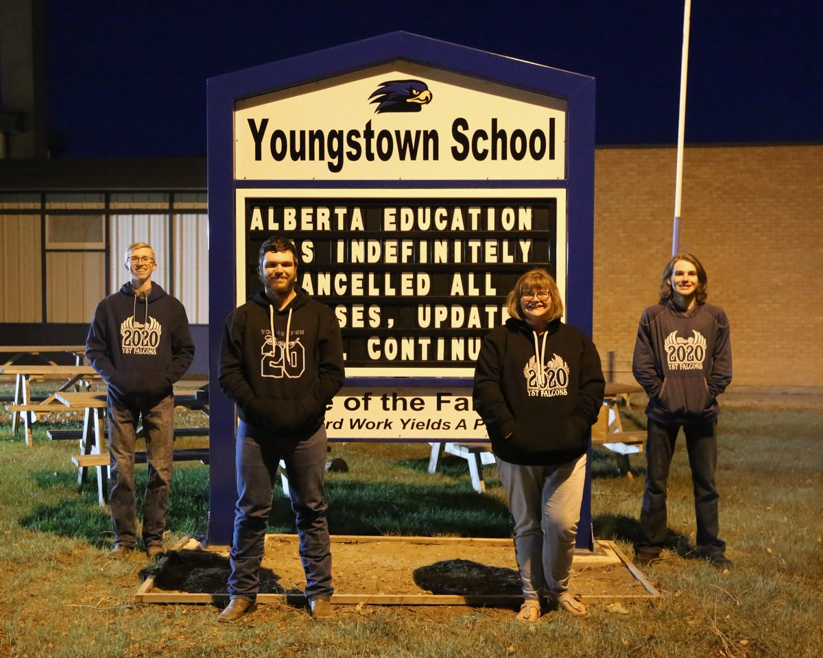 To let our Class of 2020 know we are thinking of them our four Grade 12 students, six feet apart, watched a "Pre-Graduation Ceremony" video that was prepared by those who have shared in their school careers. The video was projected in an outdoor theatre complete with snacks!