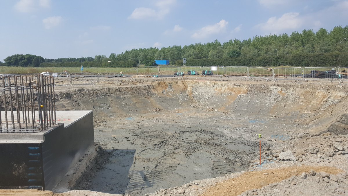 The abutment wingwalls are made of reinforced earth & blockwork; they need a stone foundation so we excavate for this, removing the topsoil & alluvial ground to the good blue fine clay beneath. Wingwalls will retain the embankment of A14 slip on top of bridge 38/