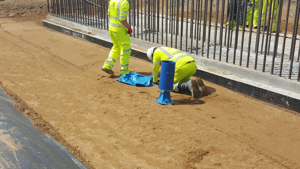 We backfill with an engineered Class 6 aggregate which is very fine to allow it to be compacted well. Pic 2 shows the "Sand Replacement Test" which is a compaction test; it takes ages so very quickly we switched to using a Nuclear Density Gauge which is far faster 39/