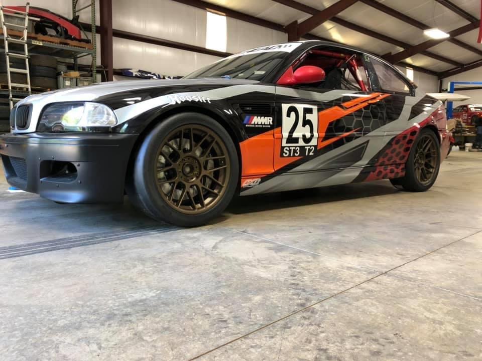 MMooreRacing's tweet photo. We got the #25 #bmwm3  back from @moreheadspeedworks today, and couldn’t wait to fit our new @apexraceparts Arc-8 wheels finished in satin bronze and wrapped with @hoosiertire 275/35/18R’s. We quite like the new look! Now if we can just finds a race to take it to... https://t.co/cUhHTinVIk