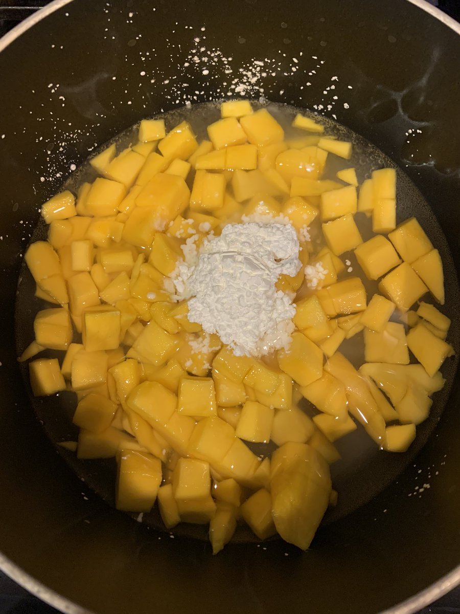 Step 5: stick your mangoes, water sugar, lemon and cornstarch in a pot a cook for a bit over medium low heat! You just wanna make the fruit soft so people with no teeth (ahem, my grandpa) can eat! Also I’m using a cup of sugar and no lemon because of my personal predicament