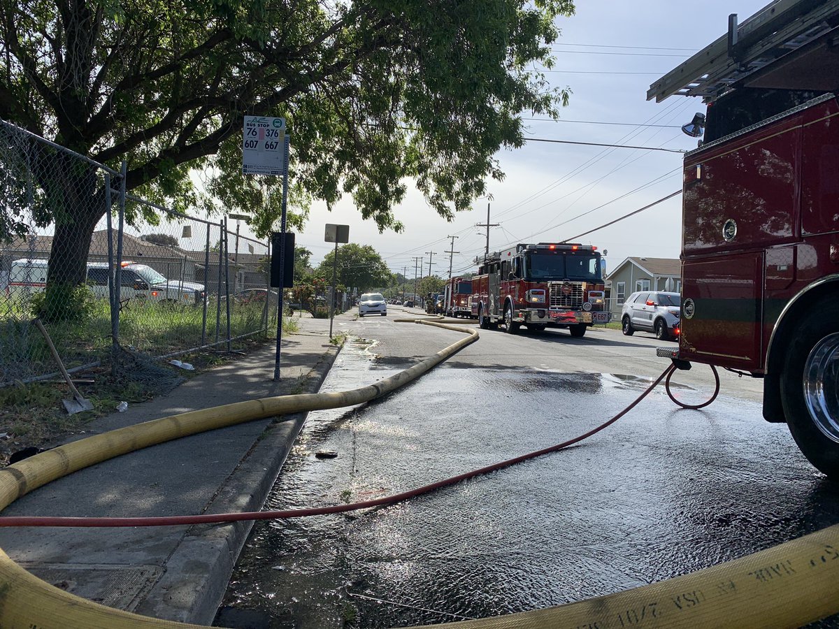 ContraCostaFire's tweet photo. Con Fire and @RFDCAOnline Richmond Fire crews currently in overhaul at a garage fire that extended to the dwelling on Market Street. Multiple roads closed in the immediate area due to the need to get water from the nearest working hydrant 800 feet away. #MarketIC. https://t.co/K2ka5f3Fkd