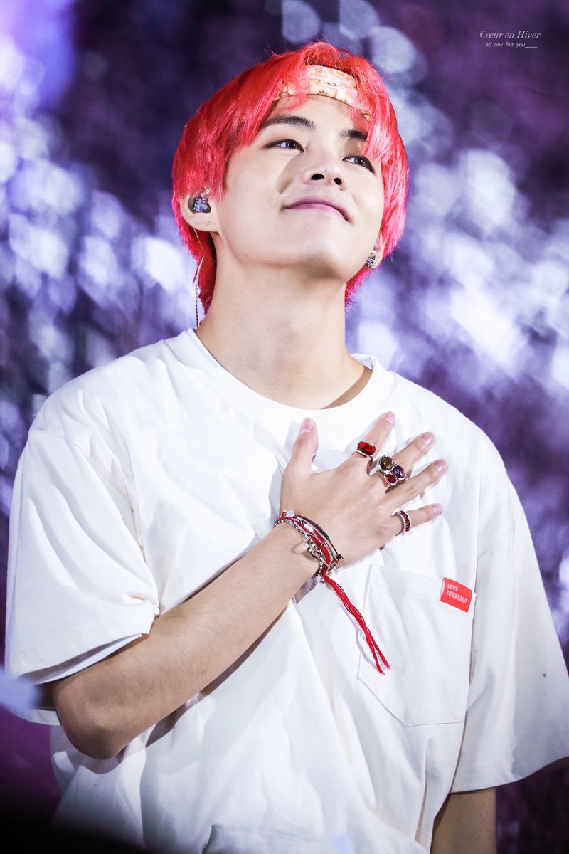 The way he puts his hand on his chest while looking passionately at armys as if saying "you own my heart"