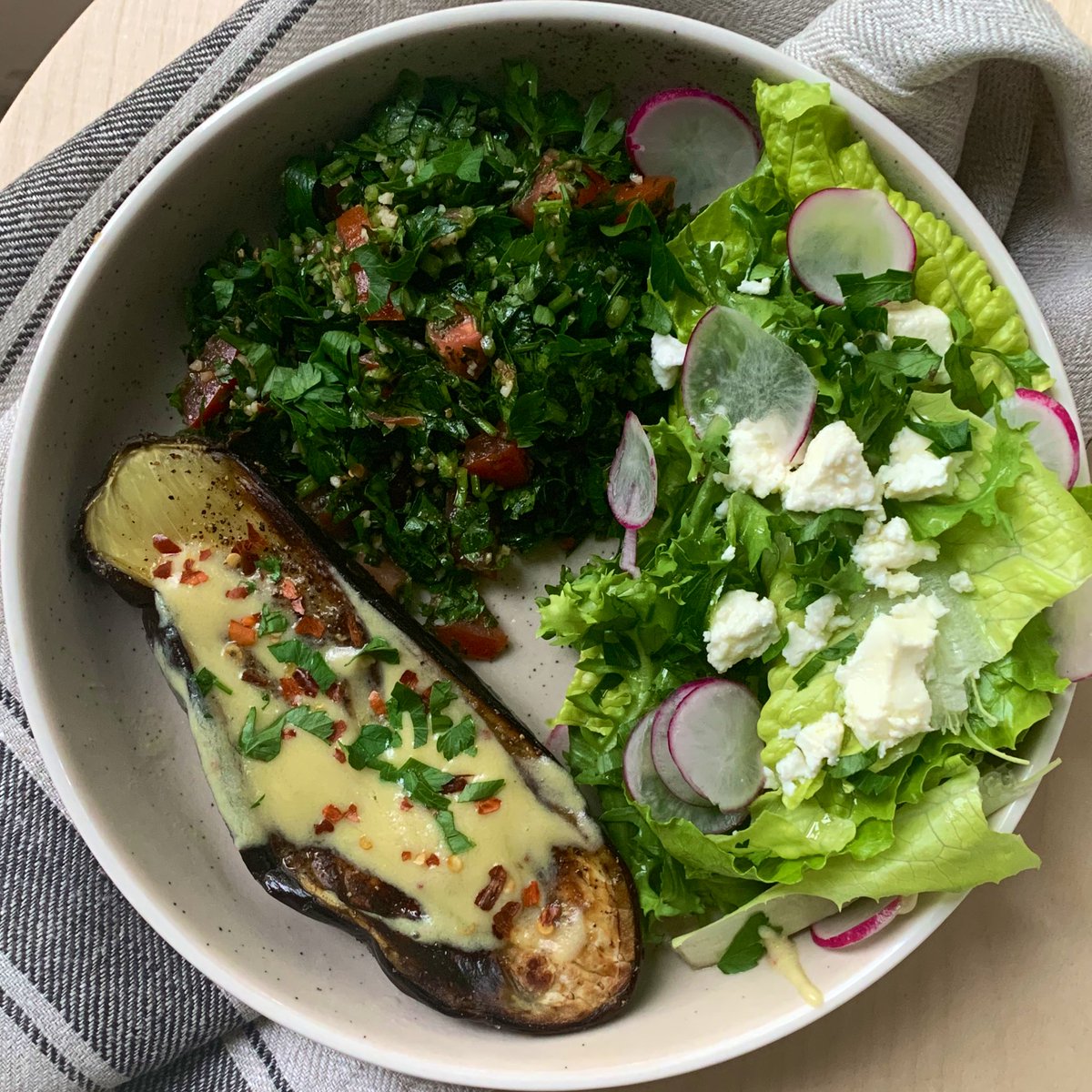 this is a late lunch of tabouli, roast eggplant w tahini/lemon/chilli dressing and some cos for crunch crunch