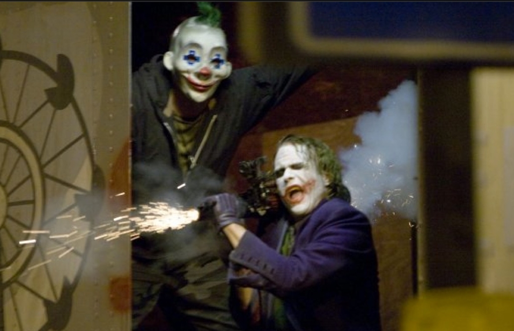 CoreofMovies's tweet photo. In The Dark Knight , when the Joker fires an RPG from a trailer, both side doors are open. If they weren't, everybody on board would have been injured by the back blast https://t.co/GbR13fs7UB