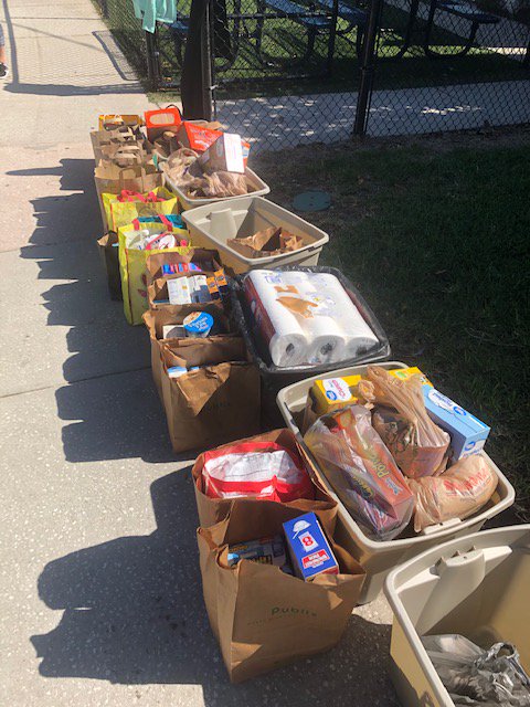 DOSACatholics's tweet photo. Volunteers from St. Paul Parish in Jacksonville Beach donated and transported about 650 pounds of food for the Beaches Emergency Assistance Ministry (BEAM) Food Pantry last weekend. Thank you for helping those in need during the pandemic, St. Paul's! https://t.co/x7mN85pZeH