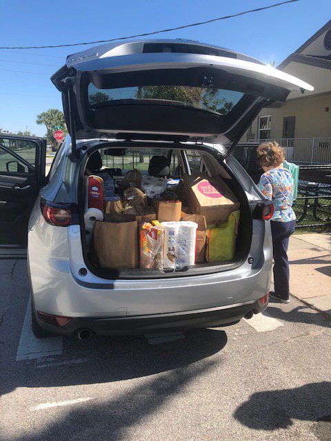 DOSACatholics's tweet photo. Volunteers from St. Paul Parish in Jacksonville Beach donated and transported about 650 pounds of food for the Beaches Emergency Assistance Ministry (BEAM) Food Pantry last weekend. Thank you for helping those in need during the pandemic, St. Paul's! https://t.co/x7mN85pZeH