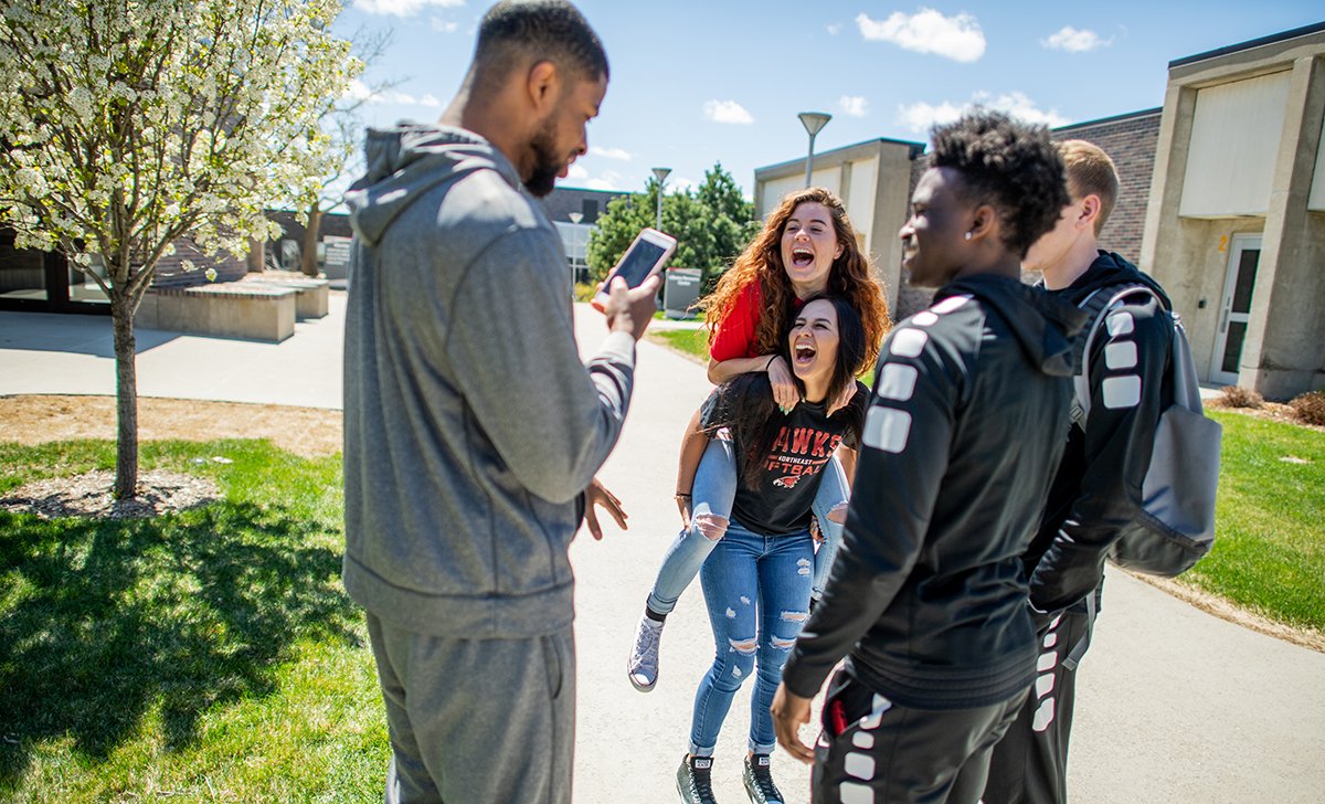 northeastedu's tweet photo. Commencement week is upon us! This year did not end as expected, but we still hope you can look back on your time at Northeast fondly. Find happiness in the memories made and the friendships and bonds built! #HawkOutCovid #NortheastGrad https://t.co/wOLVCcfGpS