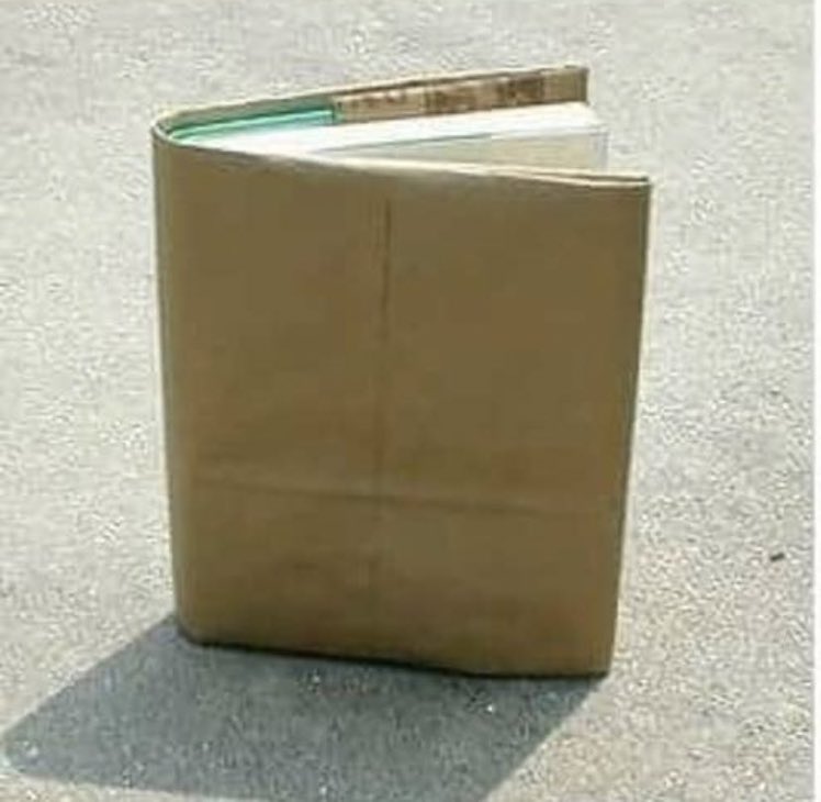 Super70sSports's tweet photo. Paper bag book covers for the win. This one used to say Algebra II but now it’s about to say Dokken or something else equally awesome. https://t.co/tORVPmZhxE
